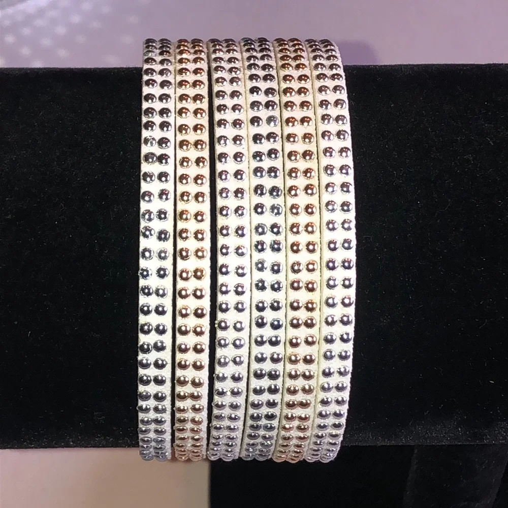 White Faux Leather Bracelet with Gold Tone & Silver Tone Studs